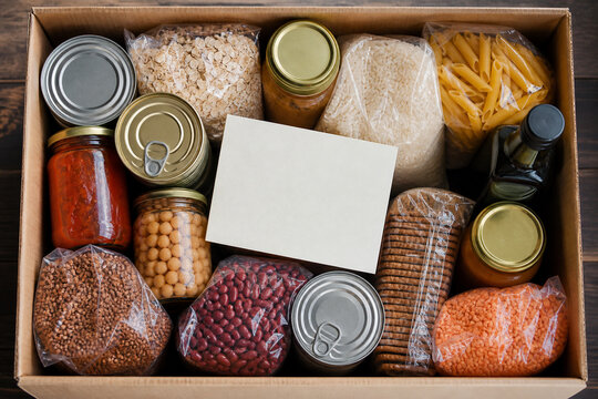 Balanced food bank parcel arranged in a cardboard box