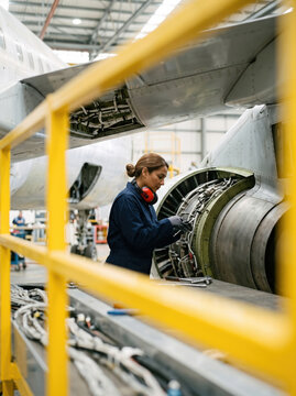 Technician Riveting a Fuselage Panel