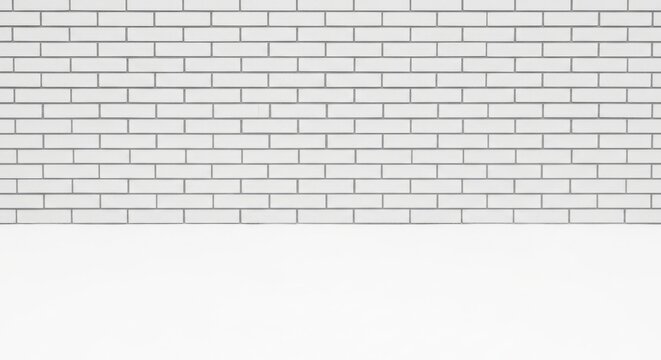 A white brick wall with a blank white space