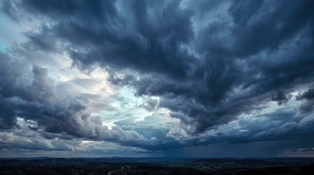 A dramatic stormy sky features dark ominous clouds and a single