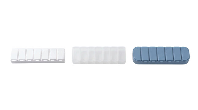 pillbox organizer three white clear blue transparent background set isolated arranged as a weekly medication storage set for pharmacy services healthcare routines and senior support