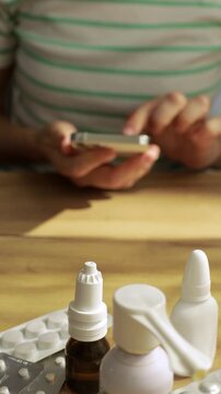 Woman Ordering Medication Online Using Smartphone at Home