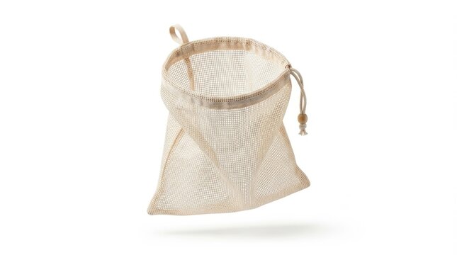 Reusable beige mesh produce bag with a drawstring closure, isolated on white background