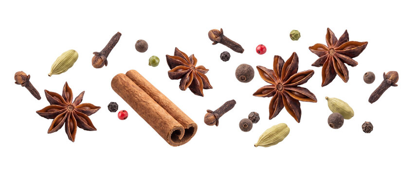 Assorted spices and cinnamon sticks isolated on transparent background