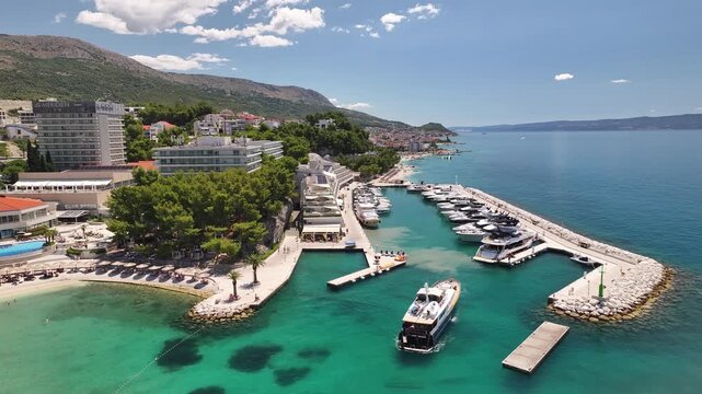 Boat Leaving The Marina In Podstrana, Croatia