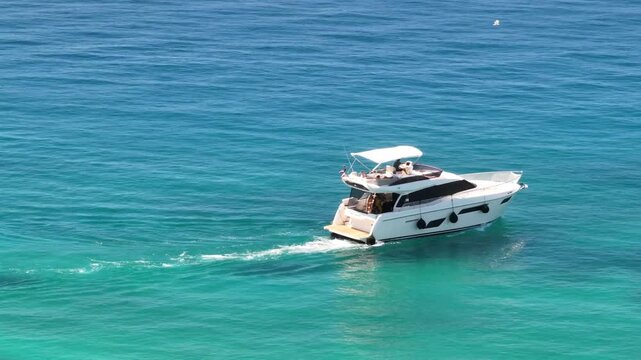 Boat Leaving Podstrana Marina On The Adriatic Sea