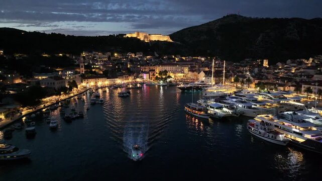 Boat Leaving Hvar Harbor At Night, Croatia