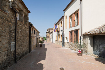 Fototapeta premium Sotosalbos village street in segovia with traditional stone buildings