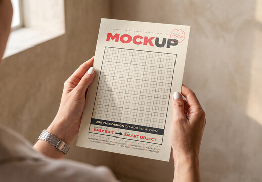Person Holding Page Flyer Brochure Mockup
