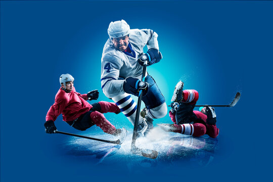 Hockey. Professional hockey player isolated on blue background. Hockey player in action. Hockey concept. Sport
