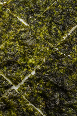 Tasty nori seaweed isolated on white. © Nikolay