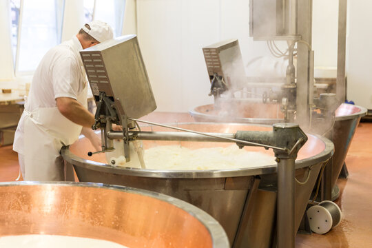Parmesan cheese prduction process in Bologna Italy