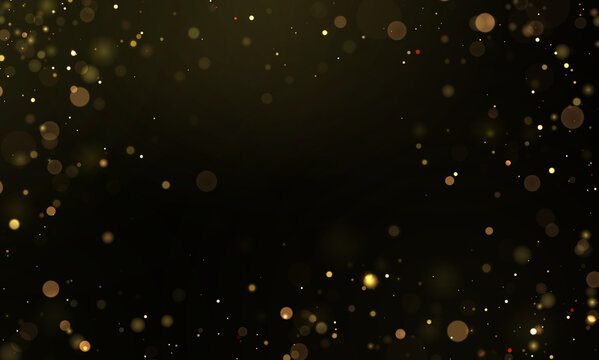 Scattered golden bokeh lights glowing against a dark black background with varying intensity and size on transparent background