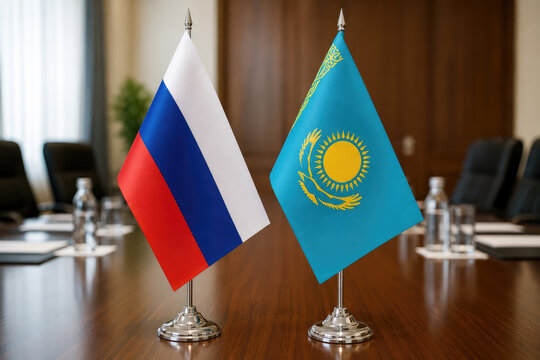 Russia and Kazakhstan Flags on Conference Table for Bilateral Cooperation