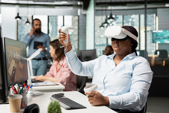 Woman uses a VR headset and CAD software to design an apartment floor plan and blueprint on a PC, creating the layout with virtual tools and digital 3D modeling for interior design.