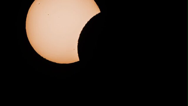 moment of totality during the 2026 solar eclipse when the moon cast a shadow over the sun 