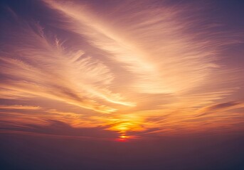 Fototapeta premium Dramatic Sunset Sky with Wispy Clouds and Golden Sun Rays.