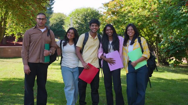 Group of indian college students posing at university campus
