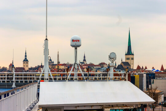 Tallinn, Estonia, March 24th, 2025. Tallinn Old Town skyline and St Olaf's Church seen from passenger ferry deck at Old City Harbour