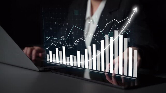 A focused businesswoman analyzes financial data with digital graphs and visualizations in a sleek office, representing growth and professional insights. Copula