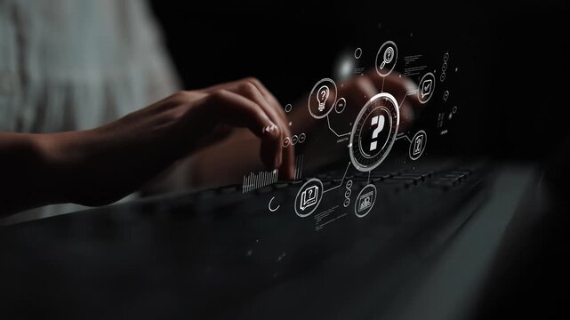 Hands typing on a keyboard with virtual icons and question mark illustrating concepts of technology and communication in a digital age. Entropy.