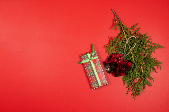 Christmas holiday gift and decorations on red background