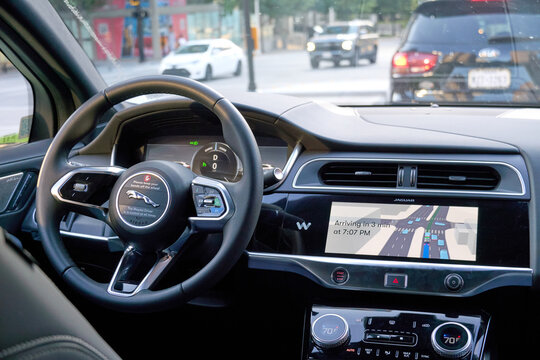 Interior view of Waymo autonomous Jaguar vehicle in Dallas streets