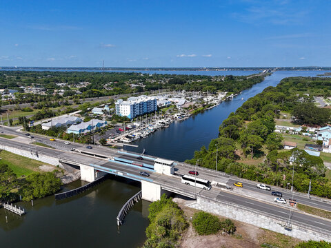 Drawbridge crossing over the Barge Canal leading to the Indian River Lagoon in Merritt Island, Florida. 