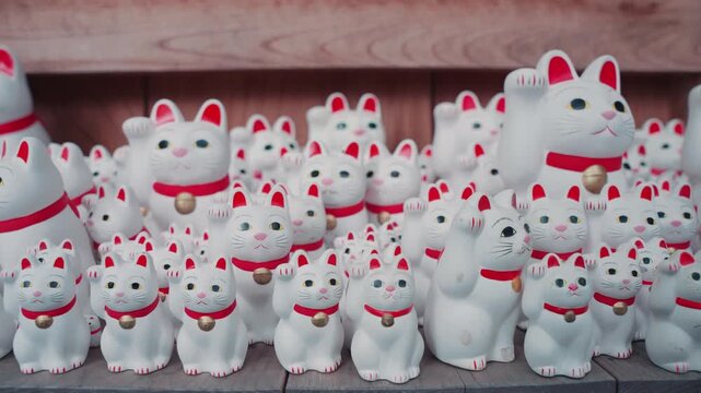 Hundreds of famous Maneki Neko cat figurines at Gotokuji Temple, highlighting a beloved symbol of good luck, prosperity, and Japanese folklore.