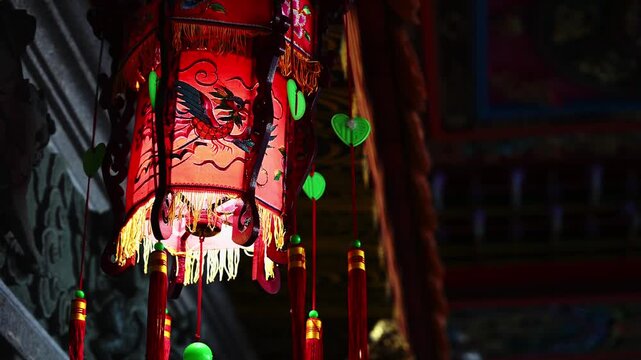 Ornate palace lanterns hanging from a traditional Taiwanese temple