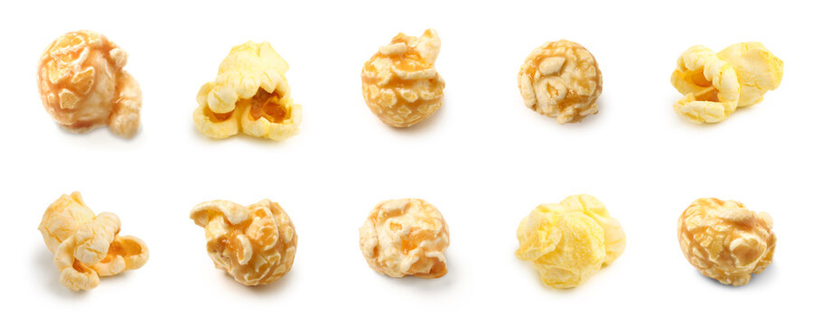 Sweet and savory popcorn kernels with caramel and cheese flavors, delicious snack food isolated on a white background