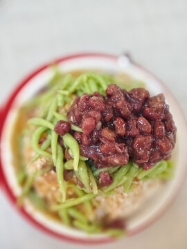 Malaysian Cendol Dessert with Red Bean shallow depth of field on White Background