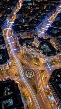 Aerial view of urban architecture and street at night