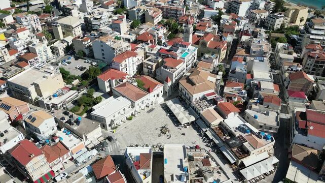 Aerial view of Solomos Square surrounded by historic buildings with terracotta roofs in the town of Zakinthos, Greece.