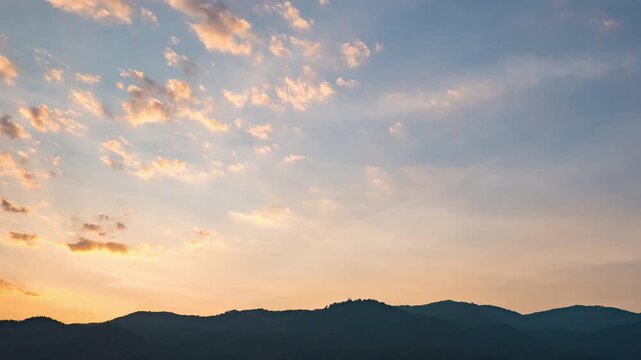 Beautiful evening clouds time-lapse, soft purple and pink sky background.