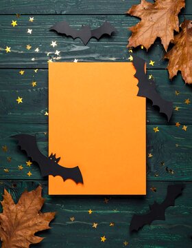 Spooky Party Invitation Concept With orange paper and decor
