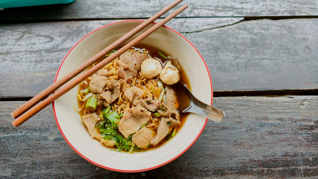 noodle with pork soup in bowl. Thai traditional food
