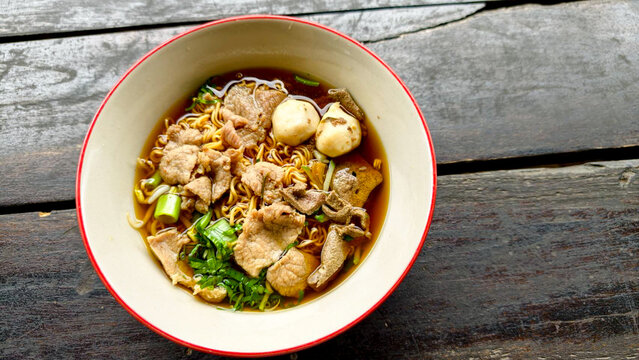noodle with pork soup in bowl. Thai traditional food