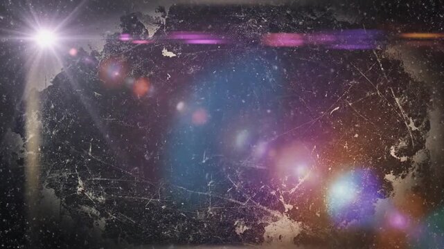 Grunge background with bright lens flares and distressed texture.