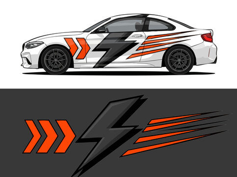 White sports car with dynamic orange and black decals