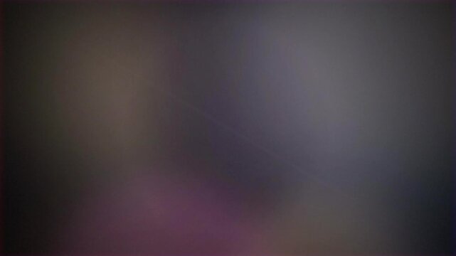 Abstract purple and grey fluid light leak with glowing soft bokeh transitions, concept for artistic video backgrounds, cinematic intros and overlays