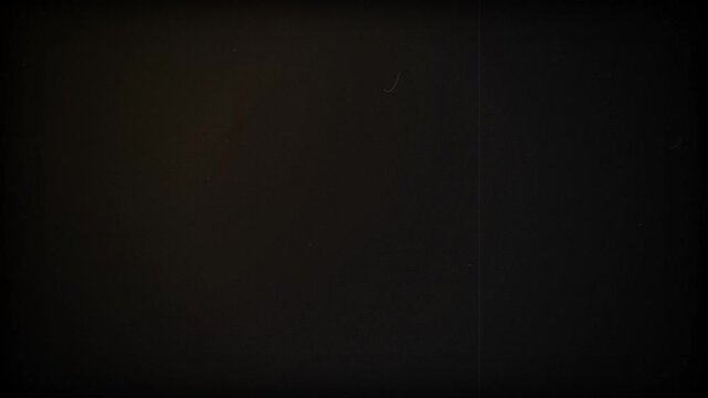 Vintage 8mm film grain texture overlay with dust, scratches, and light leaks, perfect for retro videos, cinematic projects and transition effects