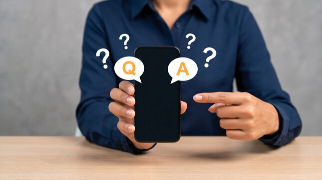 Businesswoman pointing to a blank smartphone with Q and A speech bubbles and question marks. Concept for FAQ, customer service, and online help