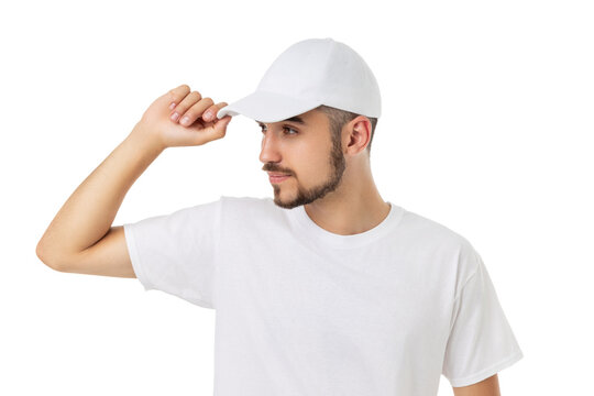 A man adjusts his white cap and t-shirt, PNG