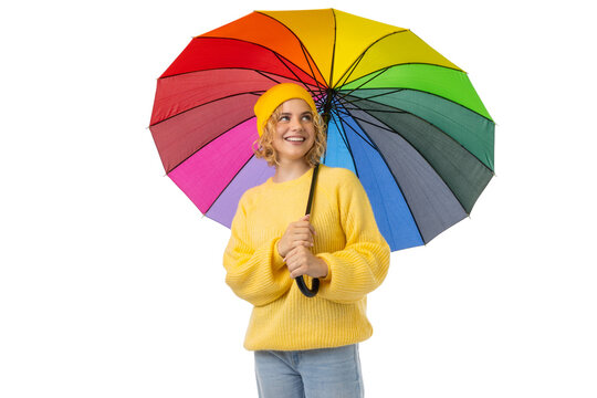 Smiling with a bright umbrella in cozy attire, isolated on white, PNG
