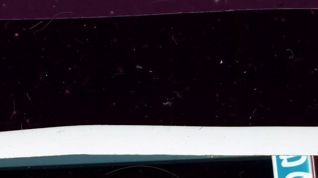 Film Artefact Transition Featuring Retro Scratches and Film Damage