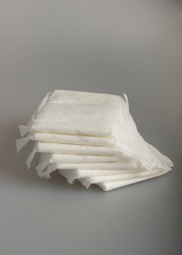 Heap of Individually Wrapped Menstrual Pads &mdash; Clean Studio Product Shot