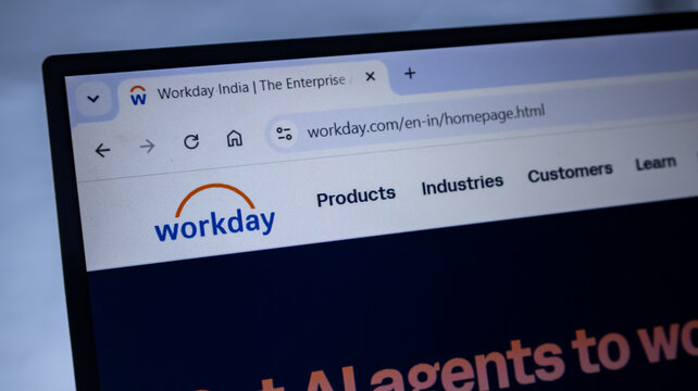 Workday corporate website on laptop screen displays enterprise cloud applications and software solutions for business management.