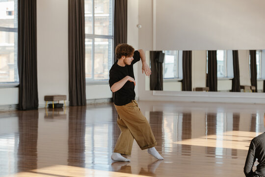 Dancer dancing alone in a contemporary dance studio
