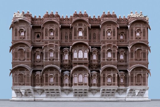 Intricate Rajasthani palace architecture with ornate jali lattice carving and decorative sandstone balconies for travel and heritage brand advertising